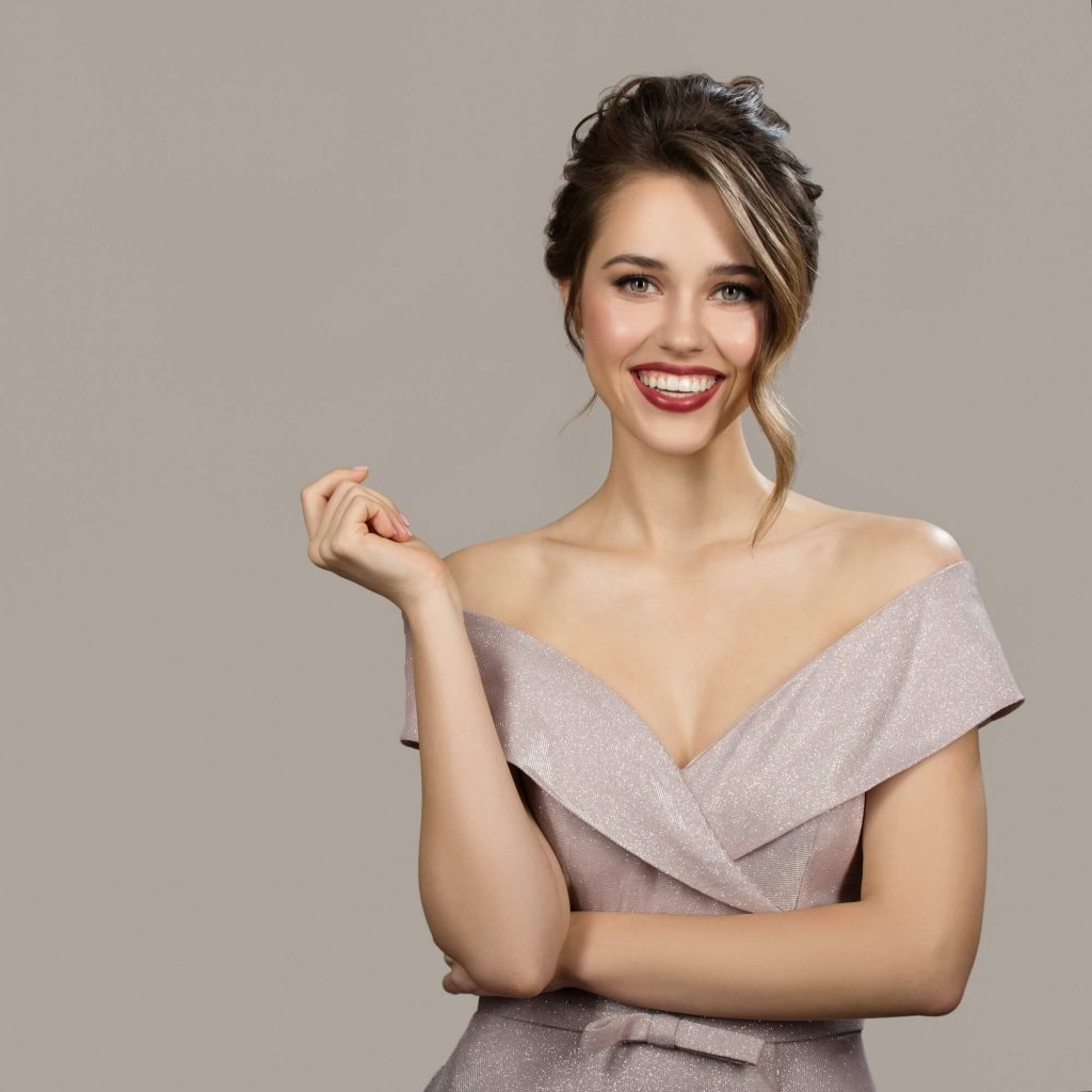 portrait of attractive smiling woman in evening dress 1 1